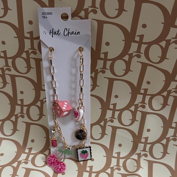 Accessories - Chain Hat Gold tone Charming Chain with Pink Accents (NWTs) Hat Not Included.
